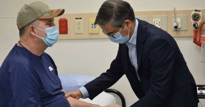 Researcher and participant in a lab
